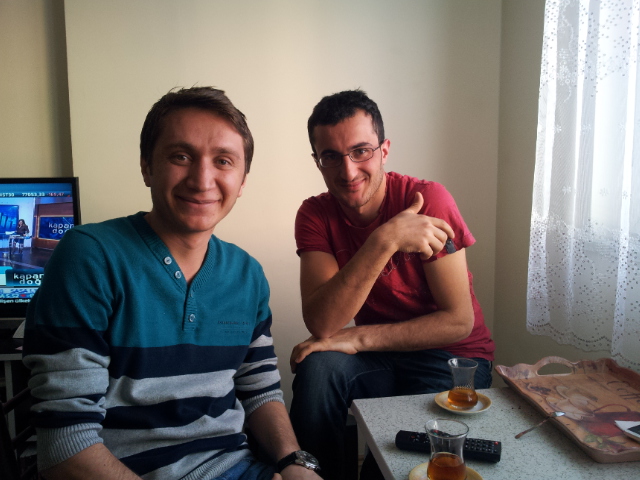 Mehmet and Ali Osman in Mehmet's apartment